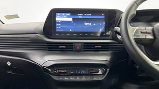 Used 2021 Hyundai New i20 Asta (O) 1.0 Turbo DCT Petrol Automatic interior MUSIC SYSTEM & AC CONTROL VIEW