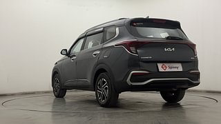 Used 2022 Kia Carens Prestige Plus 1.4 Petrol 7 STR Petrol Manual exterior LEFT REAR CORNER VIEW