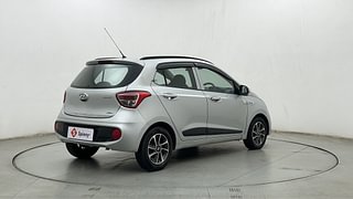 Used 2018 Hyundai Grand i10 [2017-2020] Sportz (O) AT 1.2 Kappa VTVT Petrol Automatic exterior RIGHT REAR CORNER VIEW