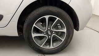 Used 2018 Hyundai Grand i10 [2017-2020] Sportz (O) AT 1.2 Kappa VTVT Petrol Automatic tyres LEFT REAR TYRE RIM VIEW
