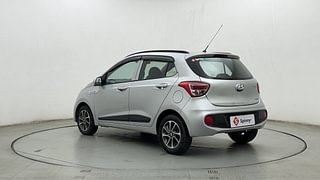 Used 2018 Hyundai Grand i10 [2017-2020] Sportz (O) AT 1.2 Kappa VTVT Petrol Automatic exterior LEFT REAR CORNER VIEW