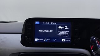 Used 2021 Hyundai Grand i10 Nios Asta 1.2 Kappa VTVT Petrol Manual top_features Integrated (in-dash) music system