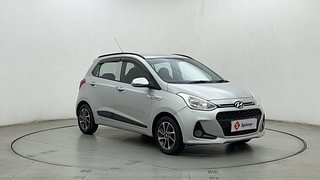 Used 2018 Hyundai Grand i10 [2017-2020] Sportz (O) AT 1.2 Kappa VTVT Petrol Automatic exterior RIGHT FRONT CORNER VIEW