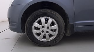 Used 2011 Maruti Suzuki Swift Dzire VXI 1.2 Petrol Manual tyres LEFT FRONT TYRE RIM VIEW
