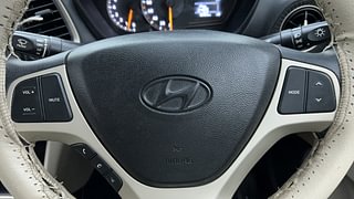 Used 2019 Hyundai New Santro 1.1 Sportz MT Petrol Manual top_features Steering mounted controls