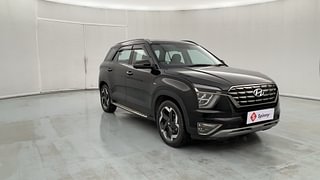 Used 2023 Hyundai Alcazar SIGNATURE (O) 7 STR 1.5 Petrol DCT Petrol Automatic exterior RIGHT FRONT CORNER VIEW