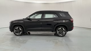 Used 2023 Hyundai Alcazar SIGNATURE (O) 7 STR 1.5 Petrol DCT Petrol Automatic exterior LEFT SIDE VIEW