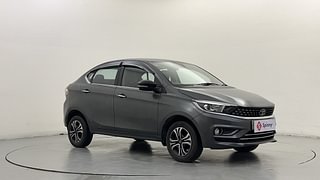 Used 2022 Tata Tigor Revotron XZ+ CNG Petrol+cng Manual exterior RIGHT FRONT CORNER VIEW