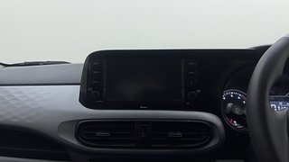 Used 2022 Hyundai Grand i10 Nios Asta AMT 1.2 Kappa VTVT Petrol Automatic top_features Integrated (in-dash) music system