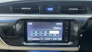 Used 2015 Toyota Corolla Altis [2014-2017] G Petrol Petrol Manual top_features Integrated (in-dash) music system