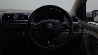 Used 2015 Skoda Rapid [2011-2016] Ambition 1.6 MPI MT Petrol Manual top_features Leather-wrapped steering wheel