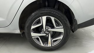 Used 2021 Hyundai Aura SX 1.2 Petrol Petrol Manual tyres LEFT REAR TYRE RIM VIEW