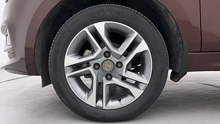 Used 2022 Tata Tigor Revotron XZA plus AMT Petrol Automatic tyres LEFT FRONT TYRE RIM VIEW