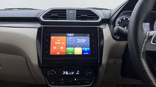 Used 2021 Maruti Suzuki Dzire ZXI AMT Petrol Automatic top_features Integrated (in-dash) music system