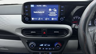 Used 2023 Hyundai Grand i10 Nios Sportz 1.2 Petrol Manual interior MUSIC SYSTEM & AC CONTROL VIEW