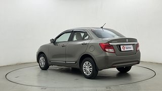 Used 2021 Maruti Suzuki Dzire VXI AMT Petrol Automatic exterior LEFT REAR CORNER VIEW