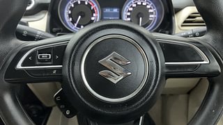 Used 2021 Maruti Suzuki Dzire VXI AMT Petrol Automatic top_features Steering mounted controls