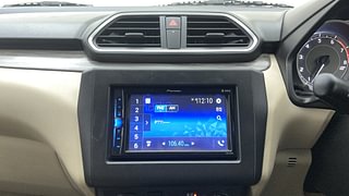 Used 2021 Maruti Suzuki Dzire VXI AMT Petrol Automatic top_features Integrated (in-dash) music system