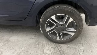 Used 2021 Tata Tigor Revotron XZ+ Petrol Manual tyres LEFT REAR TYRE RIM VIEW