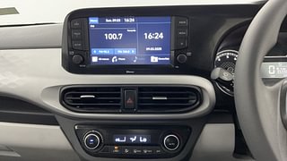 Used 2020 Hyundai Grand i10 Nios Sportz AMT 1.2 Kappa VTVT Petrol Automatic top_features Integrated (in-dash) music system