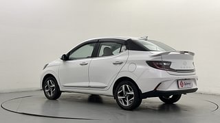 Used 2024 Hyundai Aura SX 1.2 CNG Petrol+cng Manual exterior LEFT REAR CORNER VIEW