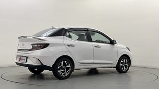 Used 2024 Hyundai Aura SX 1.2 CNG Petrol+cng Manual exterior RIGHT REAR CORNER VIEW