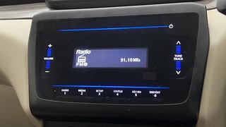 Used 2021 Maruti Suzuki Dzire VXI Petrol Manual top_features Integrated (in-dash) music system