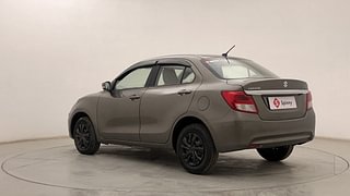 Used 2021 Maruti Suzuki Dzire VXI Petrol Manual exterior LEFT REAR CORNER VIEW