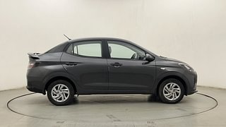 Used 2023 Hyundai Aura S 1.2 CNG Petrol Petrol+cng Manual exterior RIGHT SIDE VIEW