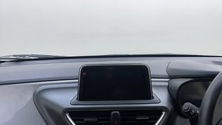 Used 2022 Tata Altroz XZ Plus 1.2 Dual Tone Petrol Manual top_features Integrated (in-dash) music system