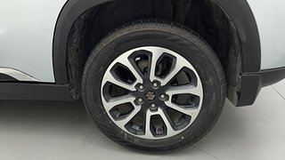 Used 2023 Maruti Suzuki Grand Vitara Alpha Smart Hybrid Dual Tone Petrol Manual tyres LEFT REAR TYRE RIM VIEW