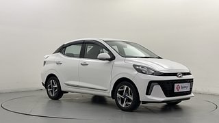 Used 2024 Hyundai Aura SX 1.2 CNG Petrol+cng Manual exterior RIGHT FRONT CORNER VIEW
