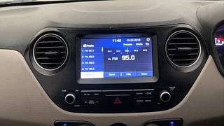 Used 2019 Hyundai Grand i10 Sportz 1.2 Kappa VTVT Petrol Manual top_features Integrated (in-dash) music system