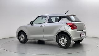 Used 2023 Maruti Suzuki Swift LXI Petrol Manual exterior LEFT REAR CORNER VIEW