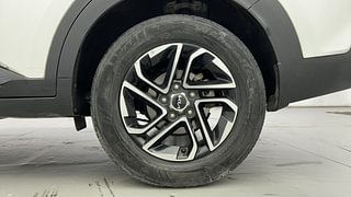 Used 2022 Kia Carens Prestige Plus 1.4 Petrol MT 7 STR Petrol Manual tyres LEFT REAR TYRE RIM VIEW