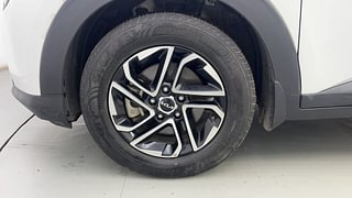 Used 2022 Kia Carens Prestige Plus 1.4 Petrol MT 7 STR Petrol Manual tyres LEFT FRONT TYRE RIM VIEW