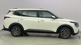 Used 2022 Kia Carens Prestige Plus 1.4 Petrol MT 7 STR Petrol Manual exterior RIGHT SIDE VIEW