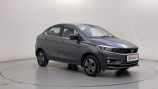 Used 2023 Tata Tigor Revotron XZ+ CNG Petrol+cng Manual exterior RIGHT FRONT CORNER VIEW
