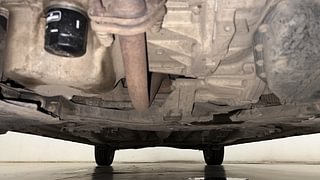 Used 2021 Maruti Suzuki XL6 Zeta AT Petrol Petrol Automatic extra FRONT LEFT UNDERBODY VIEW