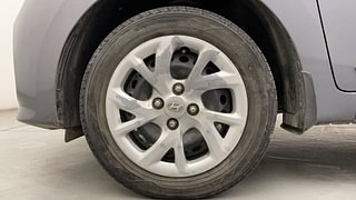 Used 2017 Hyundai Grand i10 Sportz (O) 1.2 kappa VTVT Petrol Manual tyres LEFT FRONT TYRE RIM VIEW