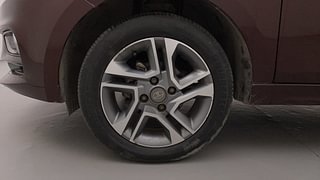 Used 2022 Tata Tigor Revotron XZA Plus AMT Dual Tone Petrol Automatic tyres LEFT FRONT TYRE RIM VIEW