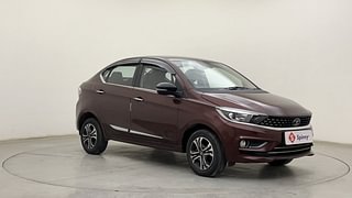 Used 2023 Tata Tigor Revotron XZ+ CNG Petrol+cng Manual exterior RIGHT FRONT CORNER VIEW