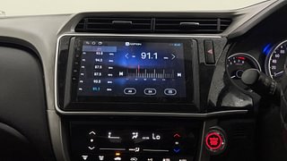 Used 2017 Honda City V 4th Gen Petrol Manual top_features Integrated (in-dash) music system