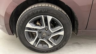 Used 2021 Tata Tigor Revotron XZ+ Petrol Manual tyres LEFT FRONT TYRE RIM VIEW