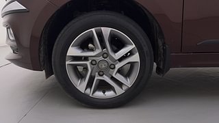 Used 2023 Tata Tigor Revotron XZ+ Petrol Manual tyres LEFT FRONT TYRE RIM VIEW