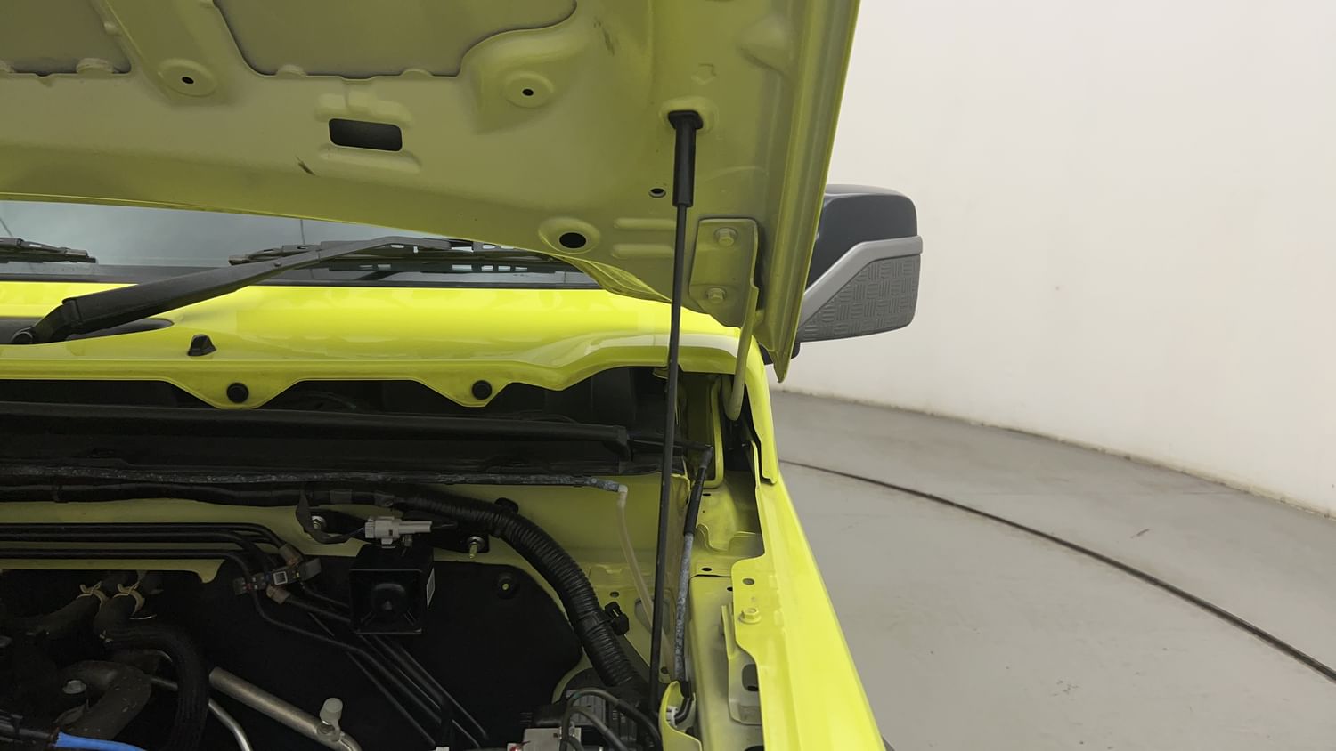 New Maruti Suzuki Jimny engine ENGINE LEFT SIDE HINGE & APRON VIEW