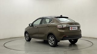 Used 2024 Tata Tigor Revotron XZ+ Petrol Manual exterior LEFT REAR CORNER VIEW