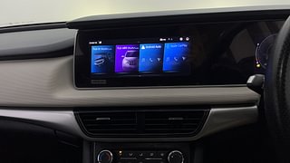 Used 2022 Mahindra XUV700 AX 5 Petrol AT 5 STR Petrol Automatic top_features Integrated (in-dash) music system