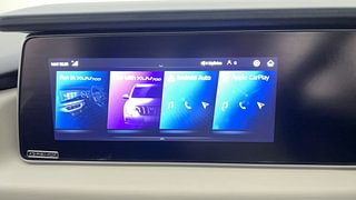 Used 2022 Mahindra XUV700 AX 5 Petrol AT 5 STR Petrol Automatic top_features Integrated (in-dash) music system