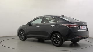 Used 2022 Hyundai Verna SX (O) 1.0 Turbo DCT Petrol Automatic exterior LEFT REAR CORNER VIEW